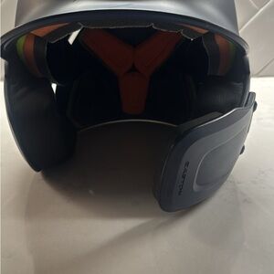 Easton Dark Blue battling helmet with chin guard.